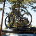 freespirit-recreation-aspen-v2-standard-hard-shell-roof-top-tent-black-closed-on-top-of-vehicle-with-bike-in-nature