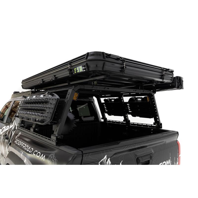 freespirit-recreation-aspen-v2-standard-hard-shell-roof-top-tent-black-closed-rear-corner-view-on-toyota-tacoma-on-white-backgroud