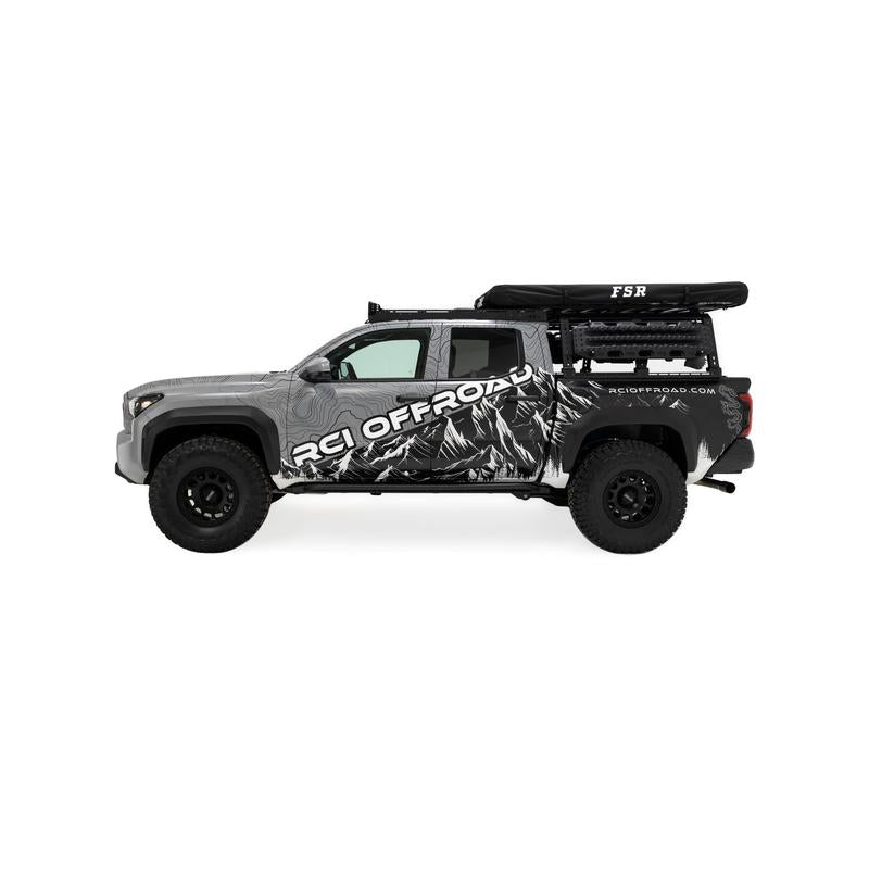 freespirit-recreation-aspen-v2-standard-hard-shell-roof-top-tent-black-closed-with-cover-side-view-on-toyota-tacoma-on-neutral-backgroud