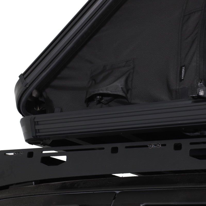 freespirit-recreation-aspen-v2-standard-hard-shell-roof-top-tent-black-open-close-up-view-heater-port-on-white-background