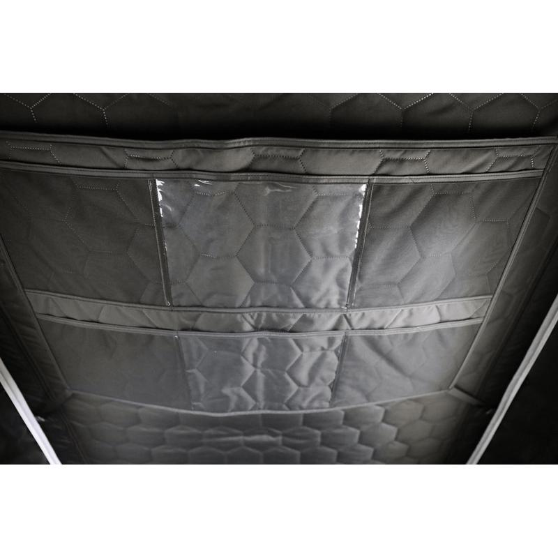 freespirit-recreation-aspen-v2-standard-hard-shell-roof-top-tent-black-open-interior-view-of-gear-grid-on-white-backgroud
