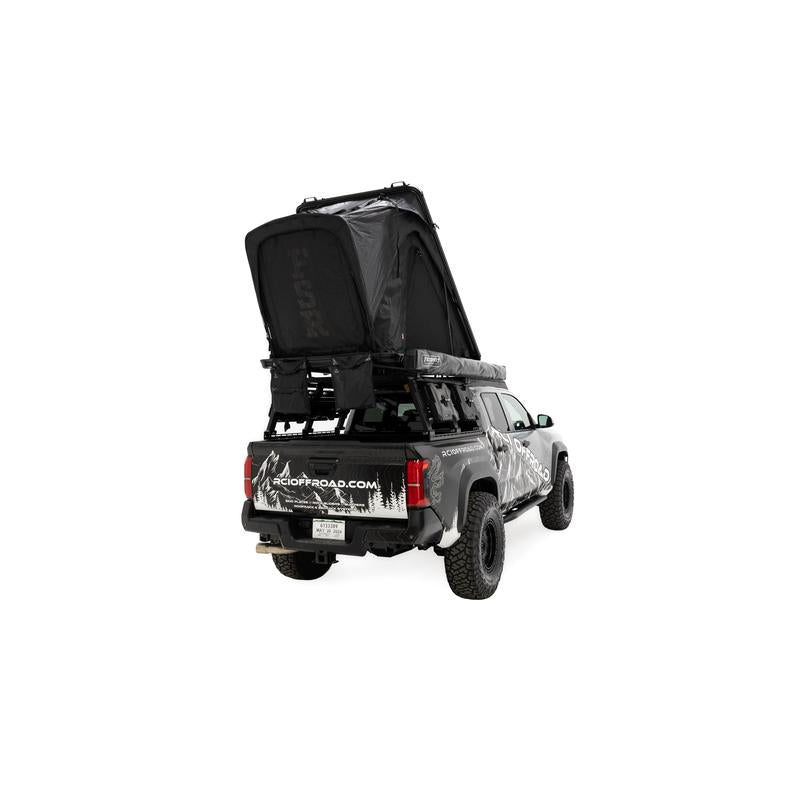 freespirit-recreation-aspen-v2-standard-hard-shell-roof-top-tent-black-open-rear-angle-view-on-toyota-tacoma-on-white-backgroud