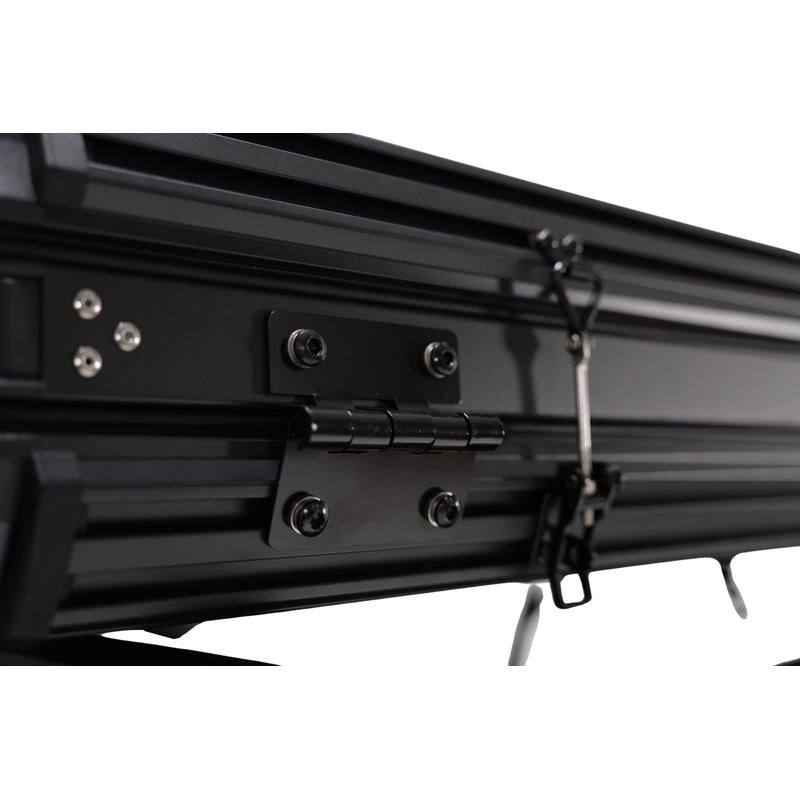 freespirit-recreation-evolution-v2-standard-hard-shell-roof-top-tent-black-close-up-view-of-frame-and-closing-mechanism-on-white-background