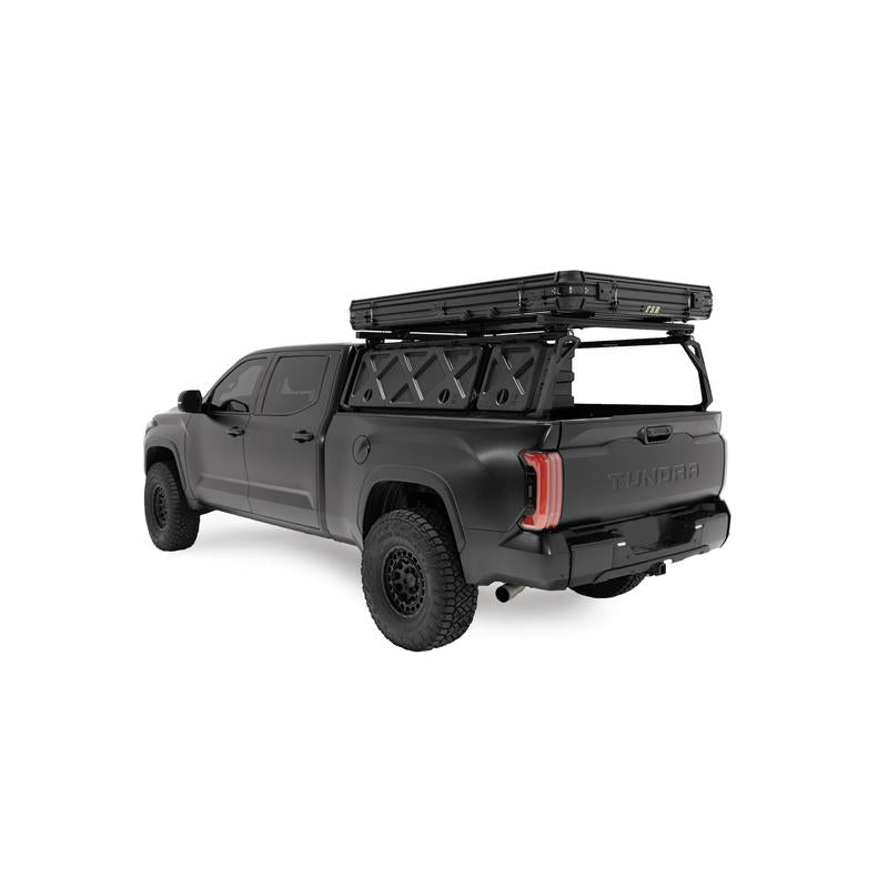 freespirit-recreation-evolution-v2-xl-hard-shell-roof-top-tent-black-closed-rear-corner-view-on-toyota-tundra-on-white-background