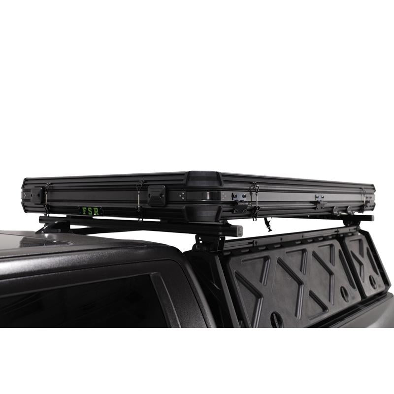 freespirit-recreation-evolution-v2-xl-hard-shell-roof-top-tent-black-closed-side-corner-close-up-view-on-toyota-tundra-on-white-background