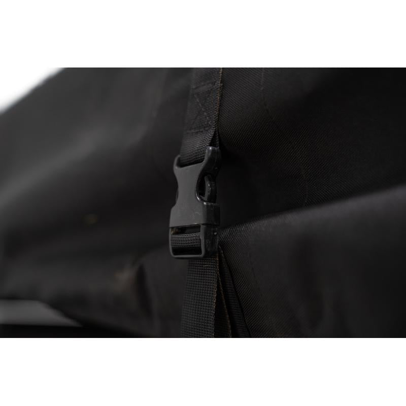 freespirit-recreation-high-country-v2-king-soft-shell-roof-top-tent-black-close-up-view-of-cover-buckle-on-neutral-background