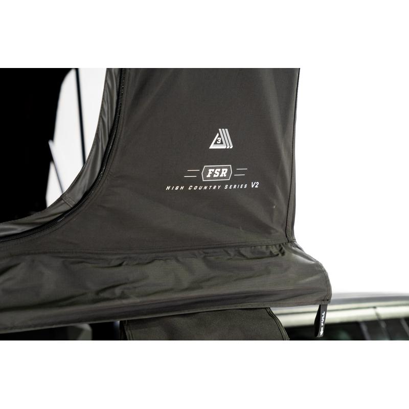 freespirit-recreation-high-country-v2-king-soft-shell-roof-top-tent-black-open-close-up-view-of-fabric-on-white-background