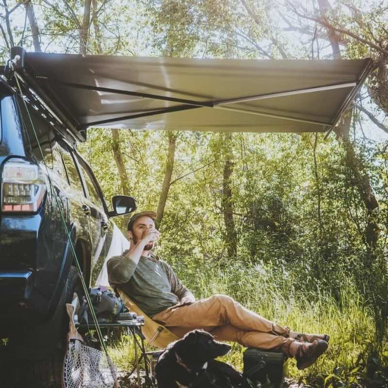 kammok-crosswing-awning-charcoal-5ft-open-side-view-on-toyota-4runner-in-camp