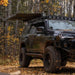 kammok-crosswing-awning-charcoal-5ft-open-side-view-on-toyota-4runner-in-nature
