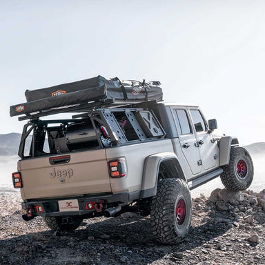 leitner-acs-forged-no-drill-bed-rack-for-jeep-rear-corner-view-on-jeep-gladiator-on-off-road-trail