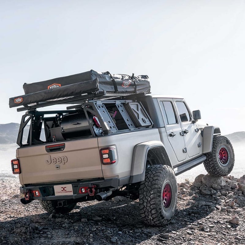 leitner-acs-forged-no-drill-bed-rack-for-jeep-rear-corner-view-on-jeep-gladiator-on-off-road-trail
