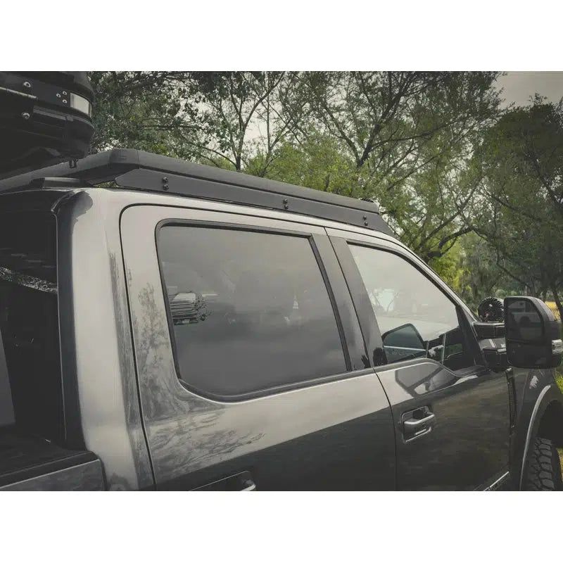 leitner-acs-roof-over-cab-platform-rack-for-ford-f250-rear-corner-view-in-nature