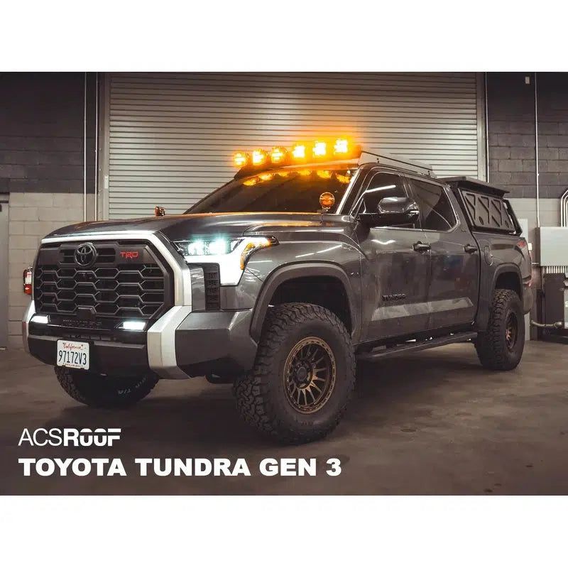 leitner-acs-roof-over-cab-platform-rack-for-toyota-tundra-gen-3-front-corner-view-in-garage