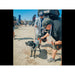leitner-hydropod-acs-rack-shower-kit-water-tank-on-vehicle-with-person-bathing-dogs-at-the-beach