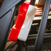 leitner-universal-mounting-plate-side-view-on-vehicle-bed-rack-with-rotopax-in-garage