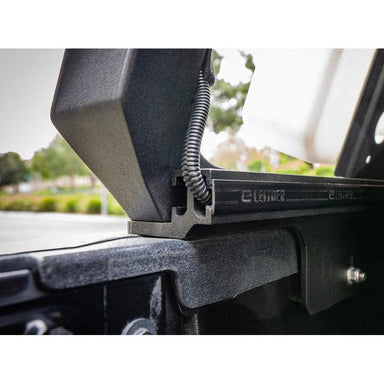 leitner-wirelok-wire-guide-system-rear-corner-view-on-truck-bed-in-nature