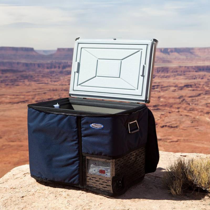 national-luna-fridge-protection-jacket-blue-with-fridge-door-opened-on-terrain