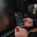 national-luna-legacy-smart-qc-fridge-and-freezer-front-view-with-person-using-nl-connect-app