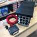 national-luna-nldc-25-and-auxiliary-battery-box-bundle-top-view-with-inclusions-on-table