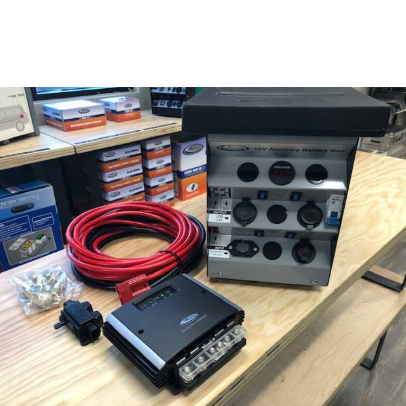 national-luna-nldc-25-and-auxiliary-battery-box-bundle-with-cable-on-table