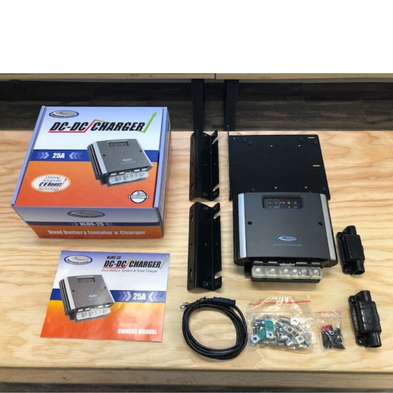 national-luna-nldc-25-dc-dc-25-amp-charger-with-manual-and-inclusions-on-table-top