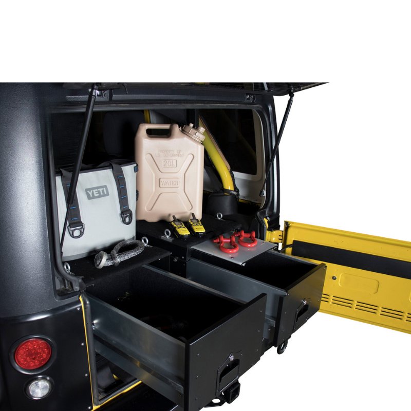 overland-vehicle-systems-cargo-box-with-slide-out-drawer-black-front-corner-view-opened-drawers-in-side-vehicle-on-white-background
