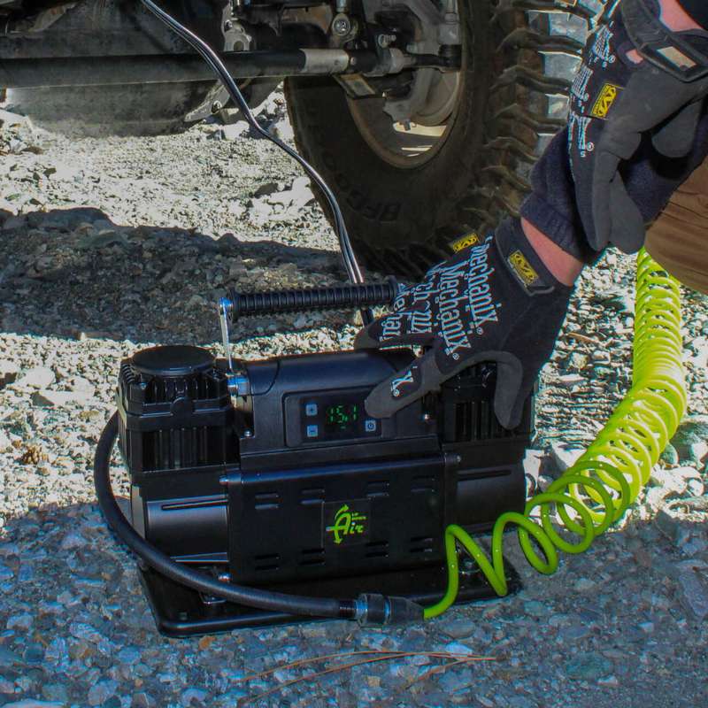 overland-vehicle-systems-egoi-portable-air-compressor-with-control-panel-front-view-with-logo-under-vehicle