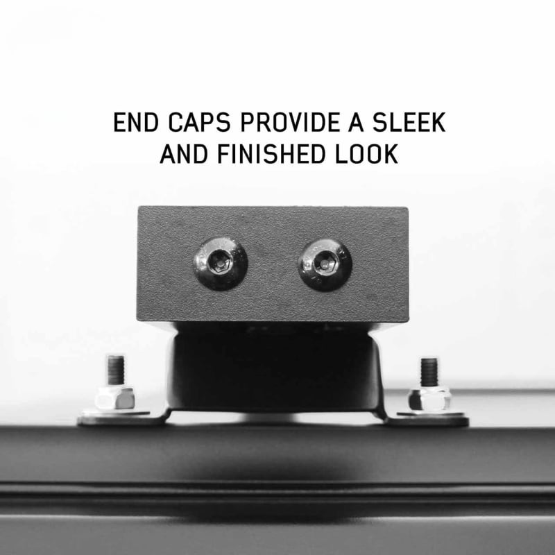overland-vehicle-systems-expedition-truck-cap-crossbars-side-view-of-end-caps-on-truck-cap-on-white-background