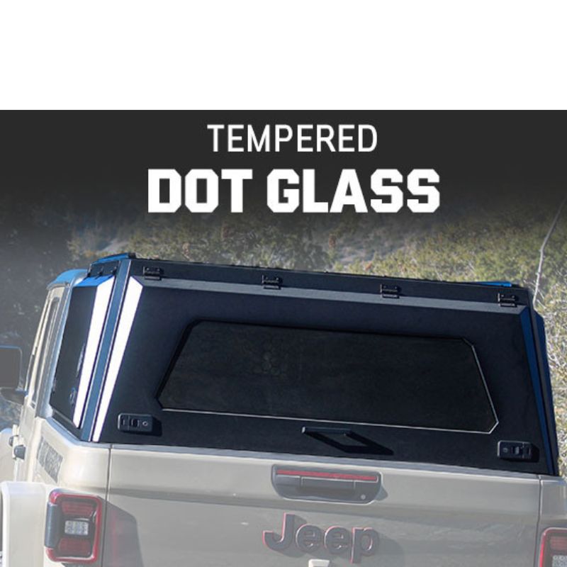 overland-vehicle-systems-expedition-truck-cap-for-jeep-gladiator-black-closed-rear-view-with-description-in-nature