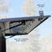 overland-vehicle-systems-expedition-truck-cap-for-jeep-gladiator-black-open-close-up-view-with-description-in-nature
