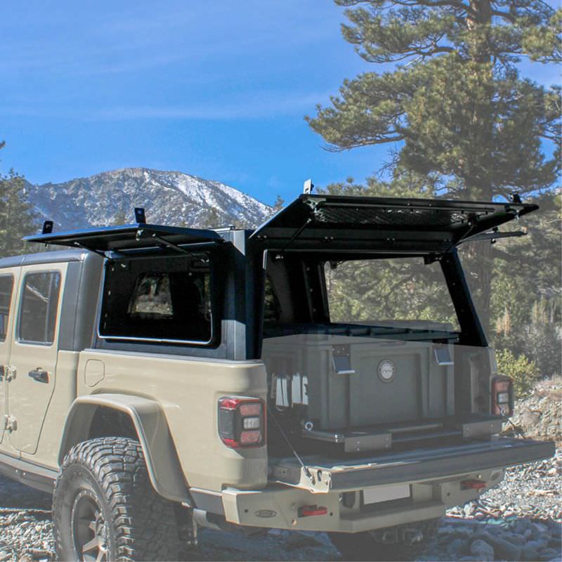 Truck cap on Jeep Gladiator in nature