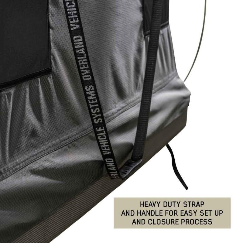 overland-vehicle-systems-hd-bundu-hard-shell-pop-up-roof-top-tent-gray-body-green-rainfly-open-close-up-view-with-heavy-duty-strap-and-handle