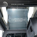 overland-vehicle-systems-magpak-camper-shell-roof-top-tent-for-toyota-tacoma-open-interior-view-sleeping-area-on-white-background