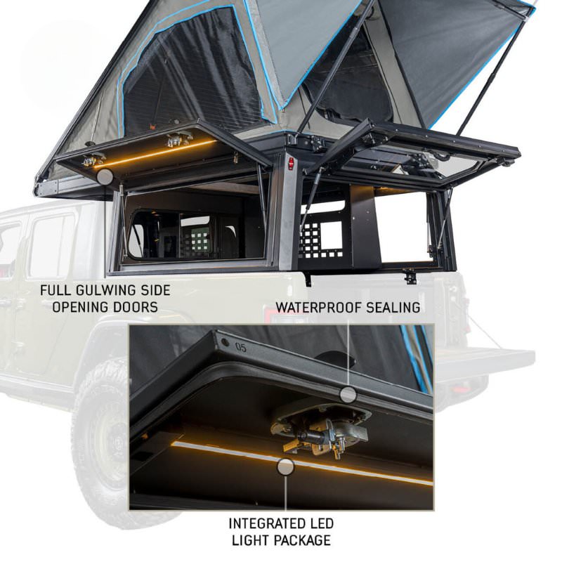 overland-vehicle-systems-magpak-camper-shell-roof-top-tent-for-toyota-tacoma-open-rear-corner-view-opening-doors-on-white-background