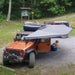 overland-vehicle-systems-nomadic-270-awning-driverside-open-front-corner-view-on-jeep-wrangler-at-campsite