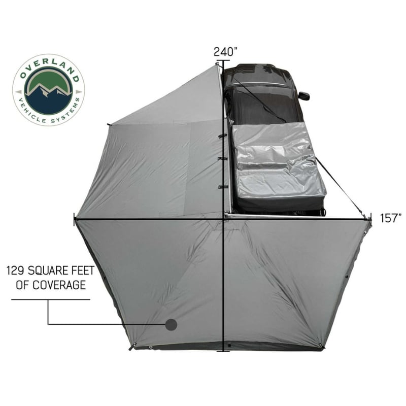 overland-vehicle-systems-nomadic-270-awning-driverside-open-top-view-of-coverage-on-toyota-tacoma-on-neutral-background