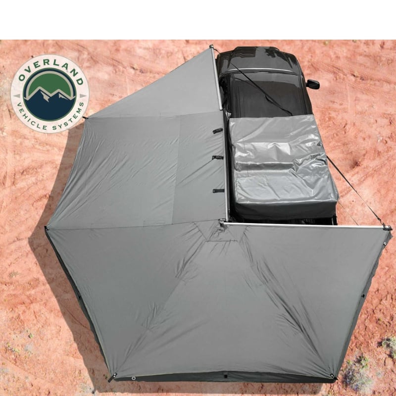 overland-vehicle-systems-nomadic-270-awning-driverside-open-top-view-on-toyota-tacoma-in-desert