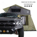 overland-vehicle-systems-nomadic-annex-fitted-to-nomadic-extended-soft-shell-roof-top-tent-gray-tent-green-annex-open-side-view-on-ford-vehicle