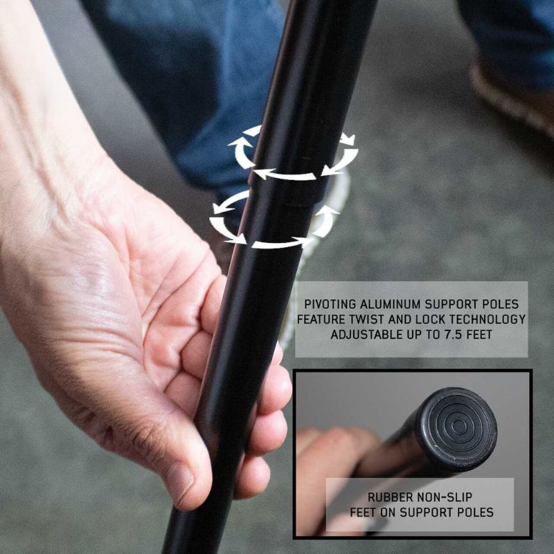 overland-vehicle-systems-nomadic-awning-180-lte-close-up-view-with-hand-holding-aluminum-support-poles