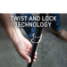 overland-vehicle-systems-nomadic-awning-180-lte-gray-open-close-up-view-with-hand-holding-telescopic-pole