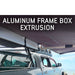 overland-vehicle-systems-nomadic-awning-180-lte-gray-open-interior-view-of-aluminum-frame-extrusion-on-vehicle-in-nature
