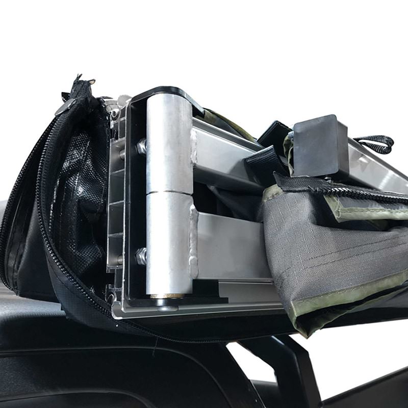 overland-vehicle-systems-nomadic-awning-180-with-zip-in-wall-dark-gray-open-close-up-view-of-heavy-duty-hinges
