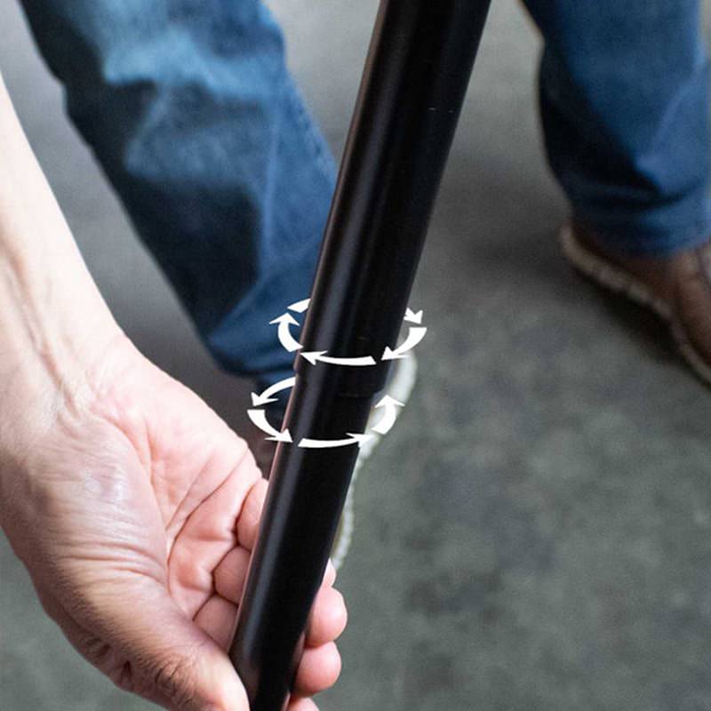 overland-vehicle-systems-nomadic-awning-180-with-zip-in-wall-dark-gray-open-close-up-view-of-pivoting-aluminum-poles-with-twist-and-lock-feature