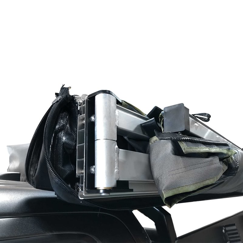 overland-vehicle-systems-nomadic-awning-270-lt-close-up-view-of-oversized-hinge-and-aluminum-rafters