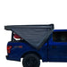 overland-vehicle-systems-nomadic-awning-270-lt-passager-side-dark-gray-open-side-view-on-ford-ranger-stx-folded-awning-and-stowed