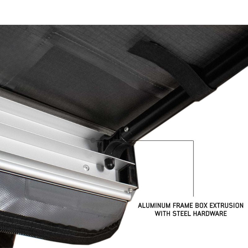 overland-vehicle-systems-nomadic-awning-4.5-ft-gray-open-close-up-view-of-aluminum-frame-box-extrusion-with-steel-hardware-on-white-background