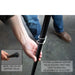 overland-vehicle-systems-nomadic-awning-4.5-ft-gray-open-close-up-view-with-hand-holding-twist-lock-pole