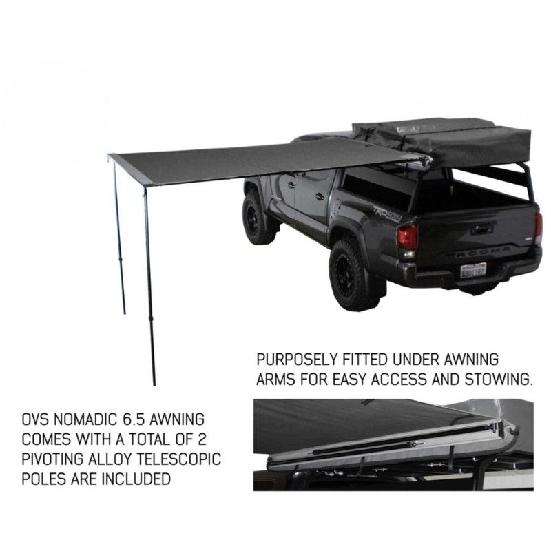 overland-vehicle-systems-nomadic-awning-6.5-ft-gray-open-rear-corner-view-on-toyota-tacoma-on-white-background