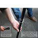 overland-vehicle-systems-nomadic-awning-8-ft-gray-close-up-view-with-hand-holding-support-poles
