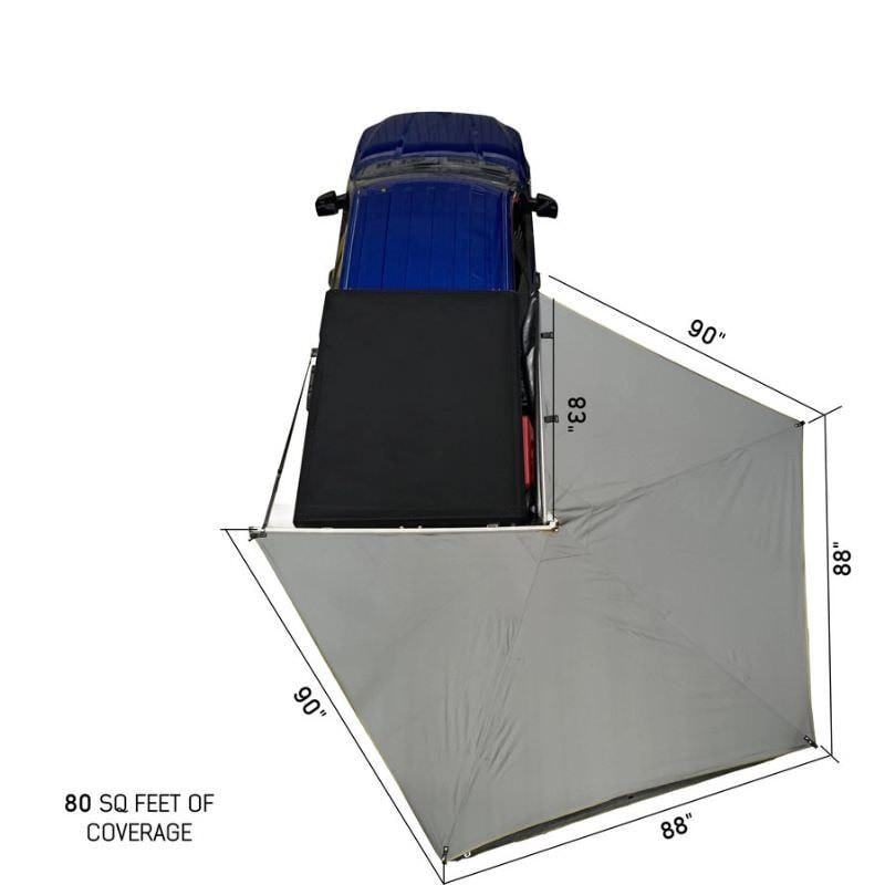 overland-vehicle-systems-nomadic-lt-270-awning-with-walls-dark-gray-passenger-side-open-drone-view-on-ford-ranger-with-product-dimensions